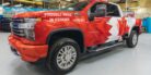 An SUV with Canadian flag paint job